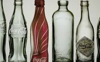 4 coca-cola bottles