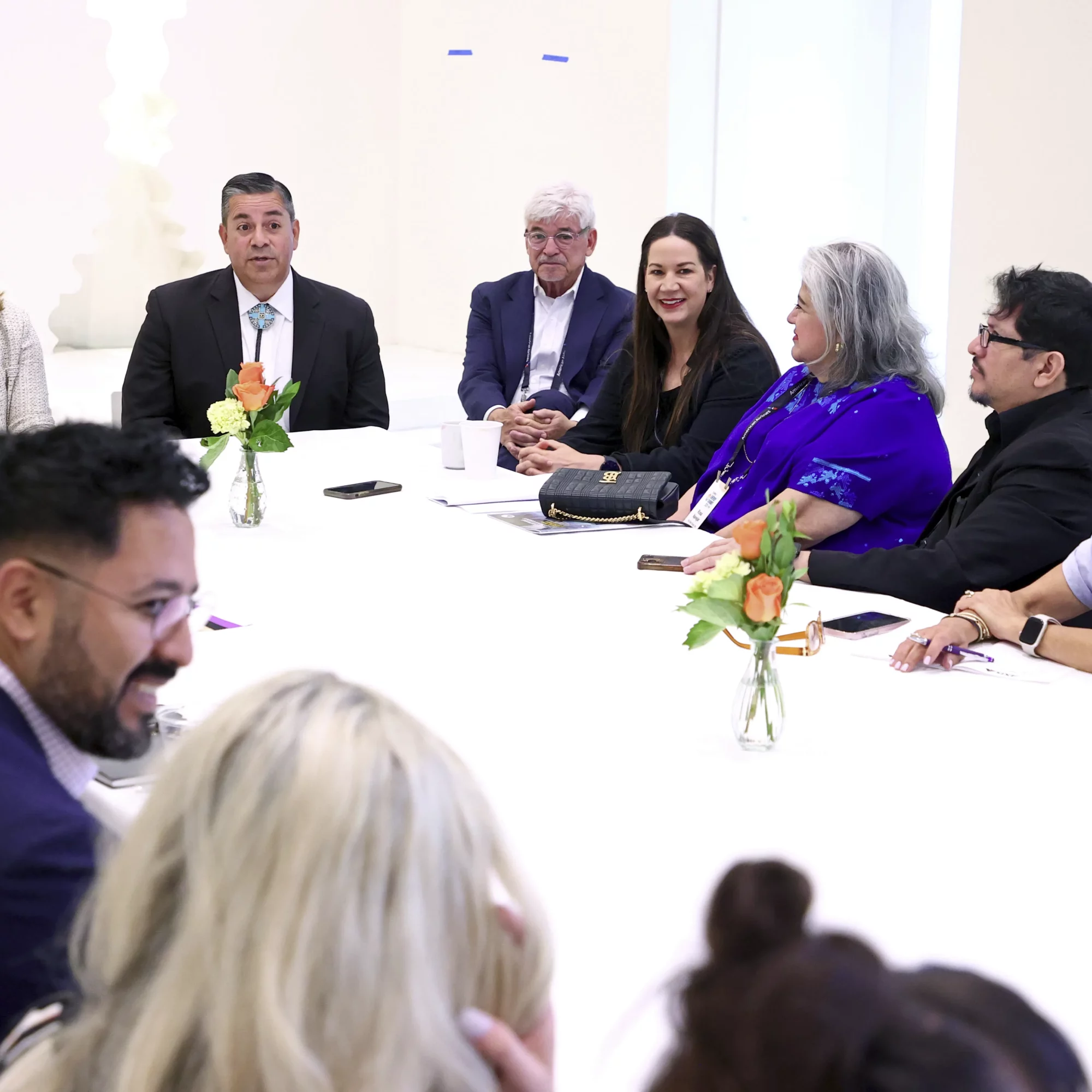 USHCC Energy Conference Attendees Talking At Table