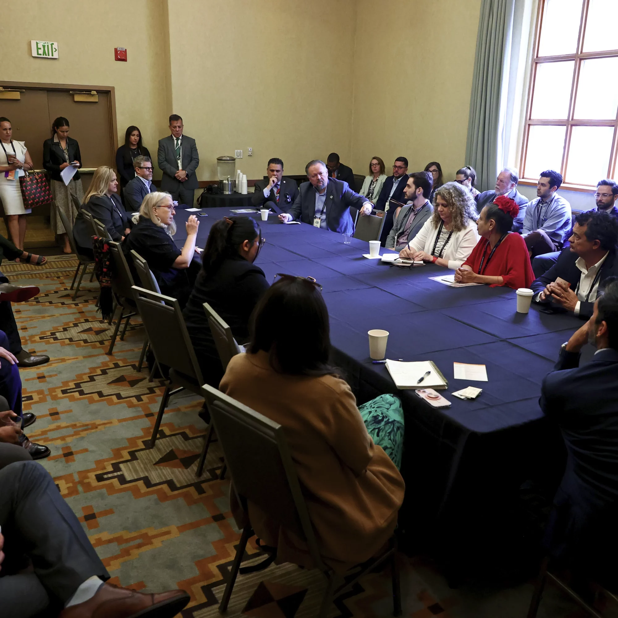 USHCC Energy Conference Attendees Talking at Table