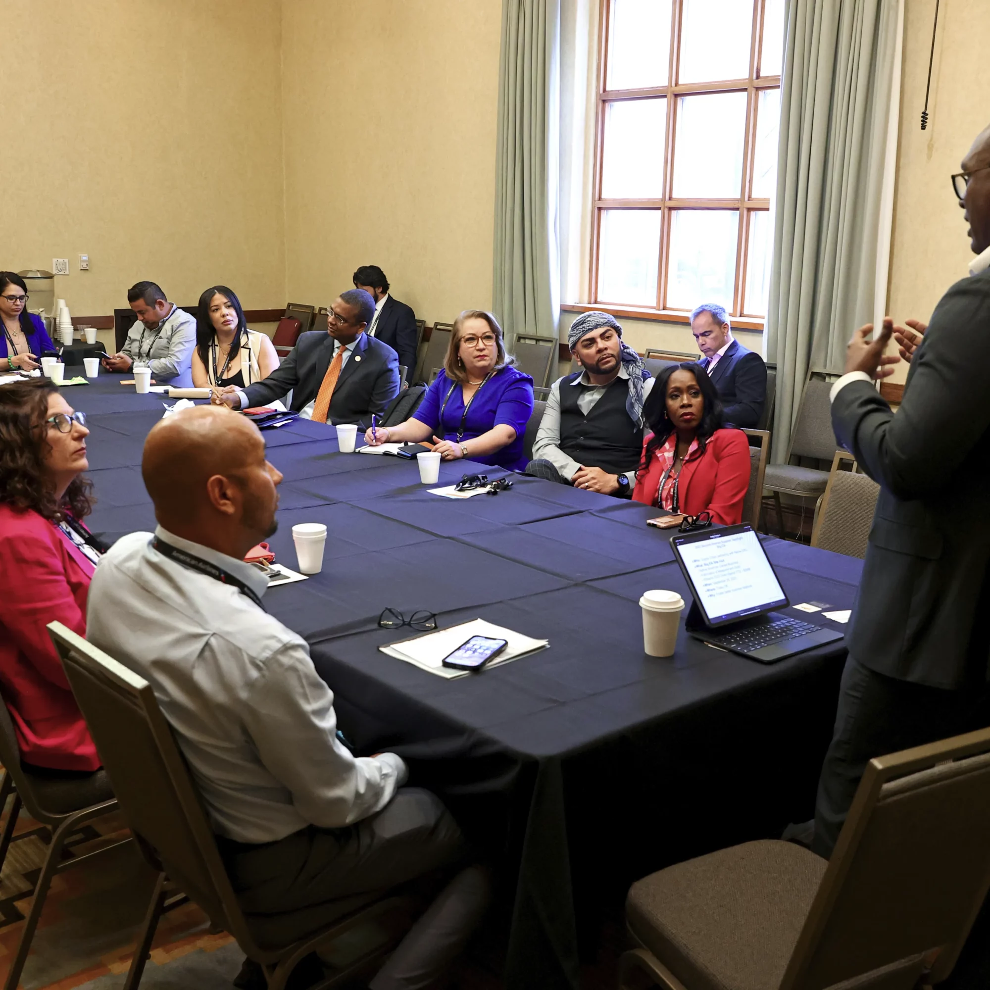 USHCC Energy Conference Attendees Talking at Table