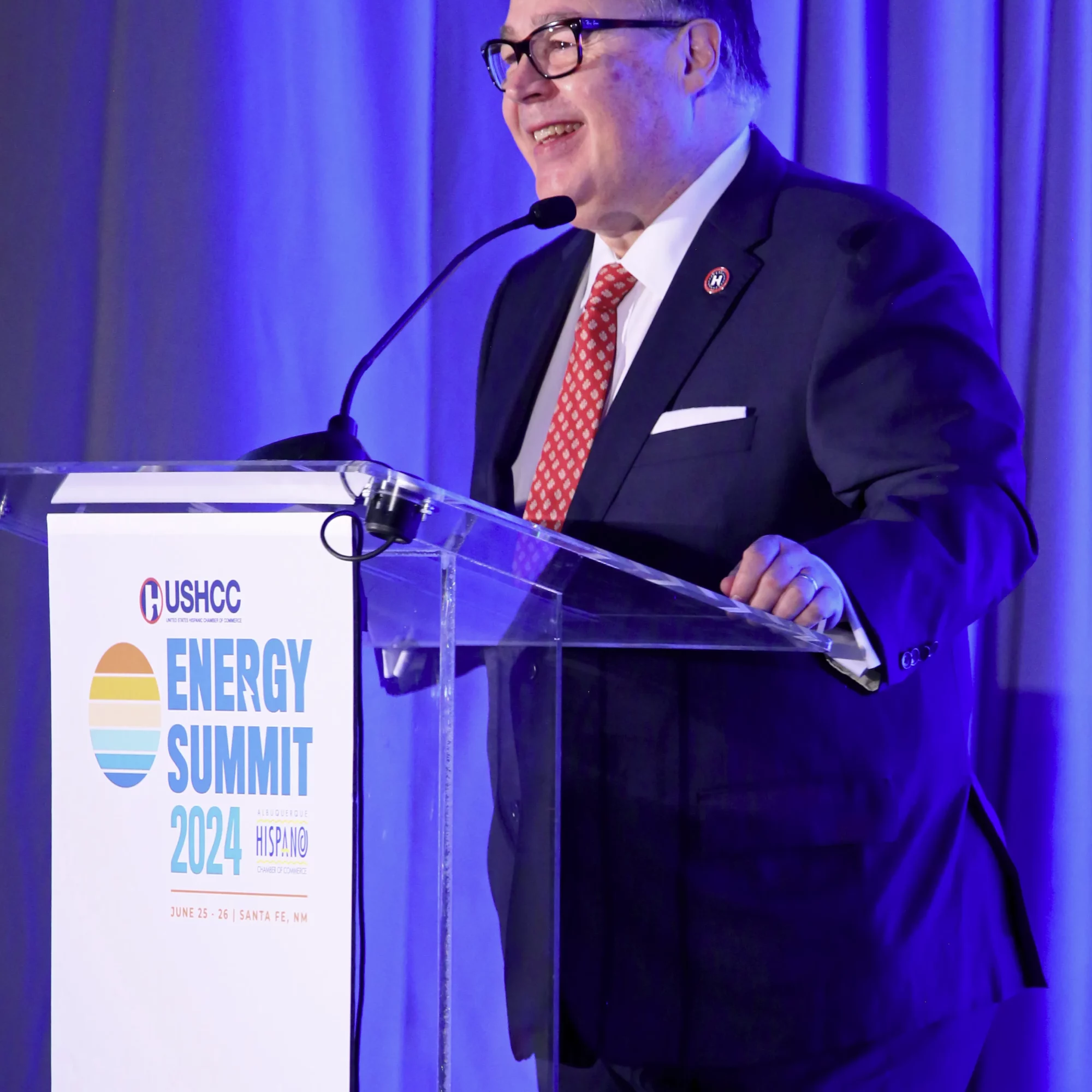 USHCC Energy Conference Attendee Talking Into Microphone