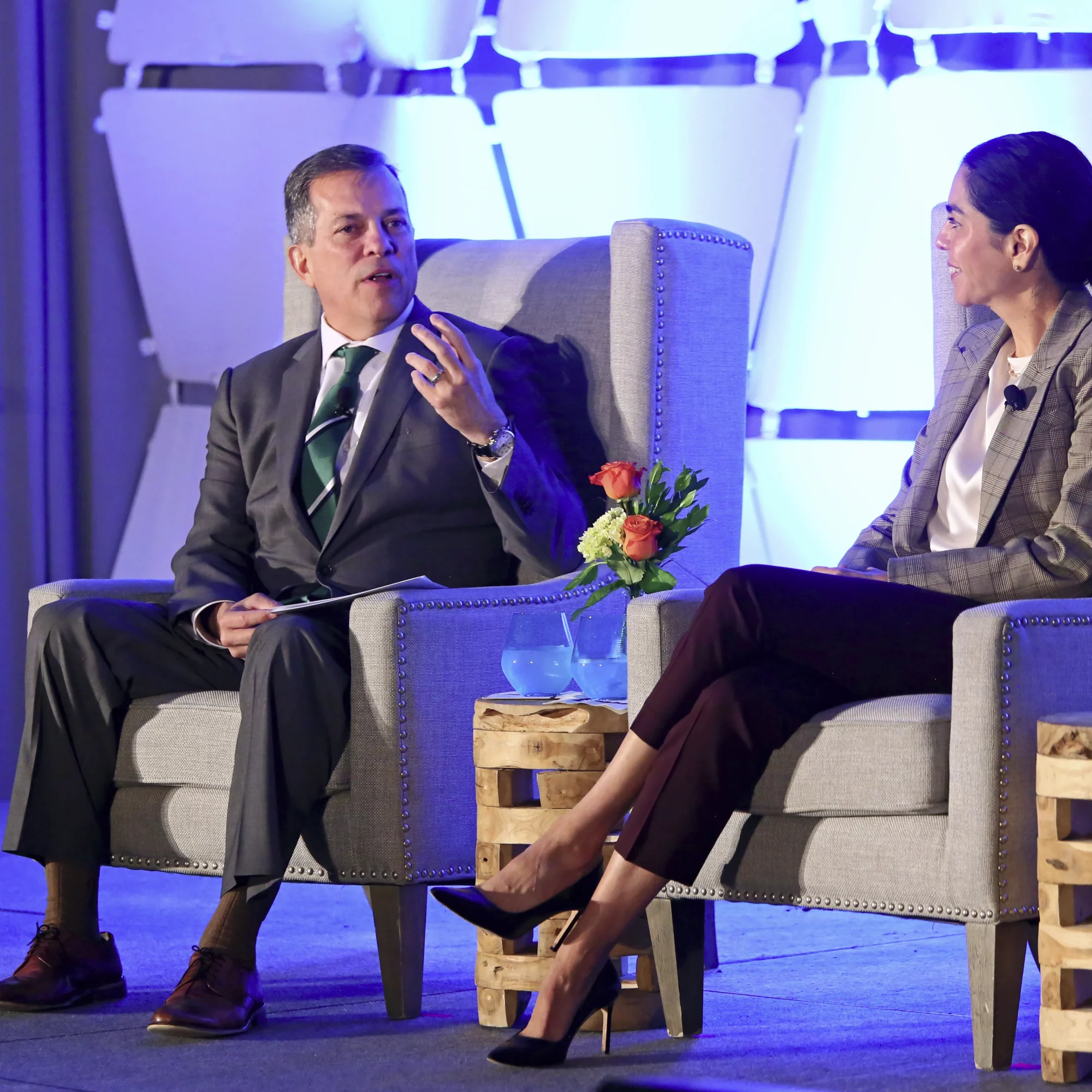 USHCC Energy Conference Attendees Talking On Stage