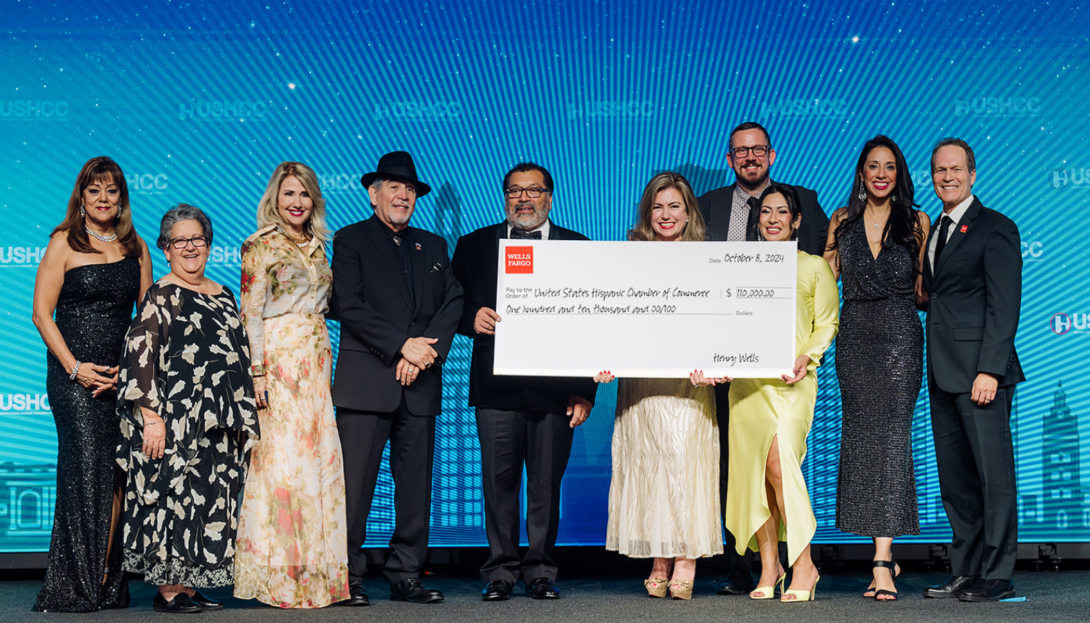 Replacement Photo Group of people holding large check for Anheuser-Busch Foundation for the USHCC Educational Fund