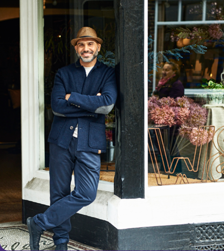 Dream Big_Social_v1_LI Woman in front of table representing her business